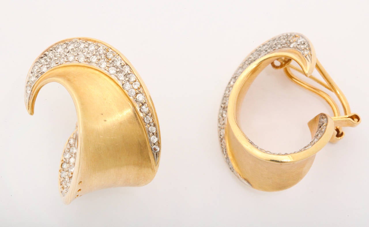 Contemporary 1980s Diamond Gold Swirl Earrings For Sale