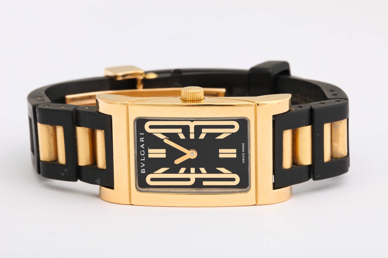 18k gold Bulgari Rettangolo watch with Swiss movement and double deployment sports band. 

RT 39 G
L3350

Face measures 1 7/8