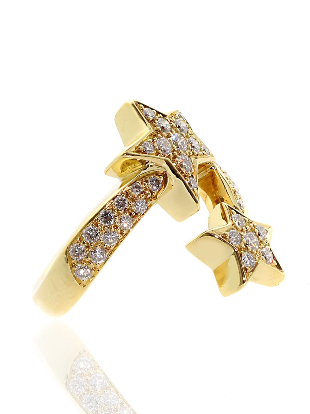 A magnificent Chanel ring from the Comete collection featuring 39 VS1 E-F Color Round Brilliant Cut Diamonds set in 18k Yellow Gold. The ring measures .90