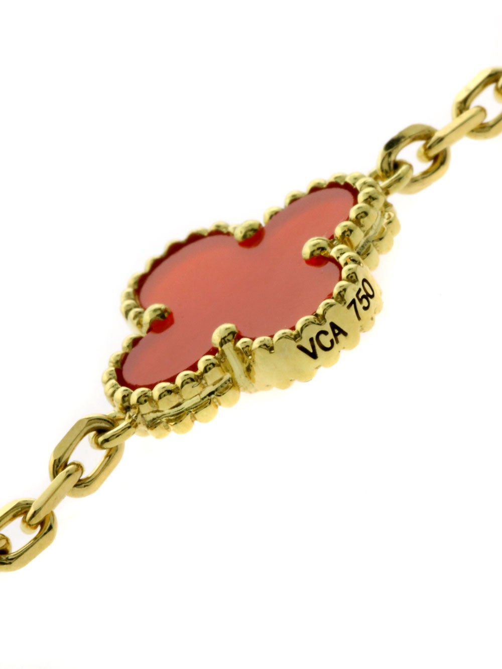 Boasting a stylish 18k Yellow Gold design and a strong showing of Van Cleef & Arpels’ iconic floral motif, this Carnelian Necklace is something truly special. Van Cleef & Arpels has extremely high standards when it comes to Carnelian, scouring the