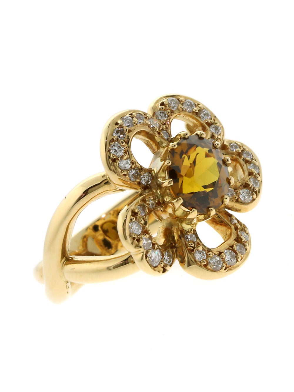 A fabulous authentic Hermes flower ring set with a beautiful Citrine to compliment the 18k yellow gold ring, while 5 outlying petals are lavishly set with the finest Hermes round brilliant cut diamonds.

Size: US 5 / EU 51
Dimensions: .66″ Inches in