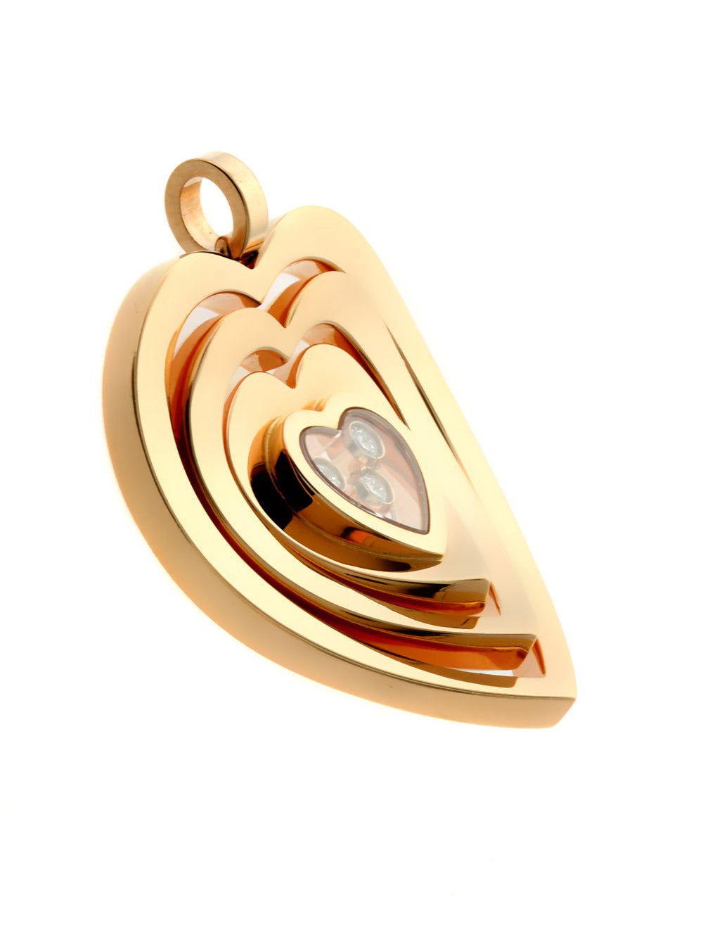 A beautiful Chopard Happy Diamond pendant enhanced with 3 of the finest Chopard round brilliant cut diamonds (.15ct) in warm 18k rose gold.

Pendant Dimensions: 1.18″ Inches wide by 1.29″ Inches in length

Inventory ID: 0000254

Brand New w/