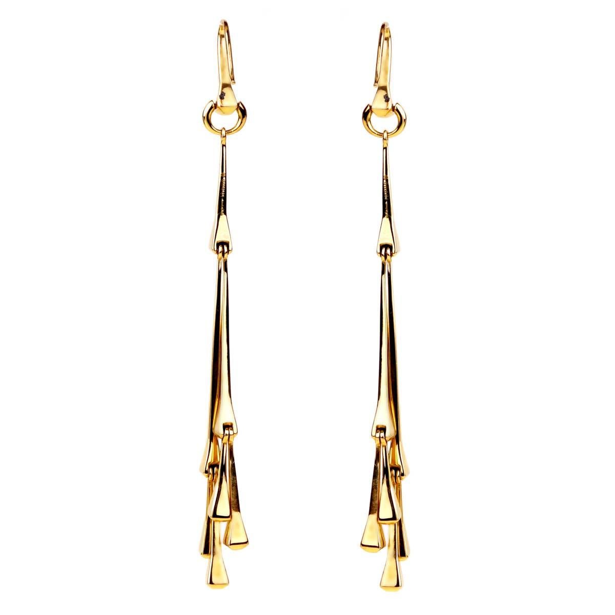 An iconic pair of Gucci Chiodo drop earrings in 18k yellow gold, the earrings measure 3.75