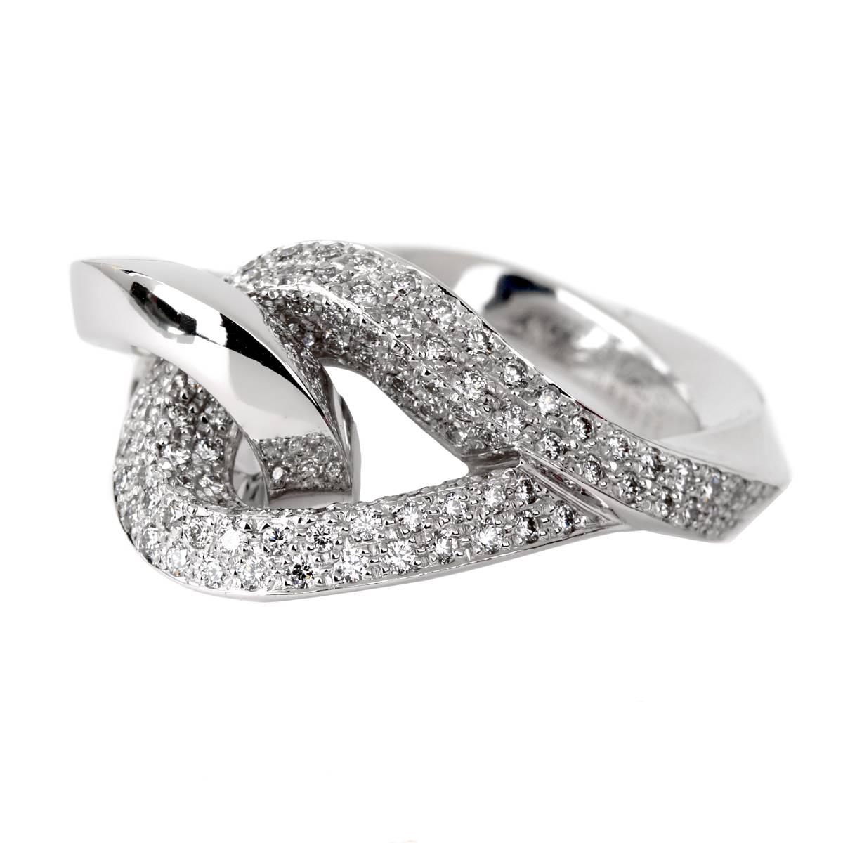 A magnificent Hermes diamond ring featuring the finest Hermes diamond paved in 18k white gold. The twisted design creates a unique cocktail ring perfect for any night out.

SIZE: EU 53 / US 6 1/4

Sku: 856