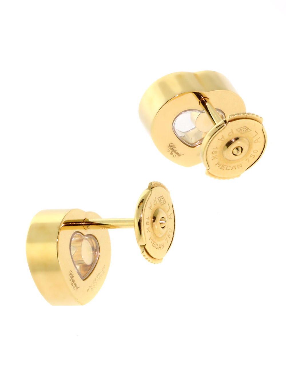 A fabulous pair of authentic Chopard Happy Diamond earrings set 26 of the finest round brilliant cut diamonds (.52ct) in 18k yellow gold.

Dimensions: .39″ Inches in diameter
Condition: New

Inventory ID: 0000236