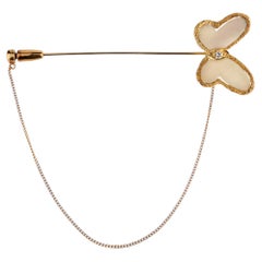 Van Cleef & Arpels – Schmetterlingsbrosche aus weißer Koralle und Diamanten, 18 Karat Gelbgold