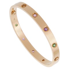 Bracelet classique Cartier Love Rainbow en or rose 18 carats avec pierres précieuses assorties, taille 17