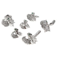Parure de boutons de manchette Cartier « Écureuil » en platine et or blanc, sertis de diamants et d'émeraudes