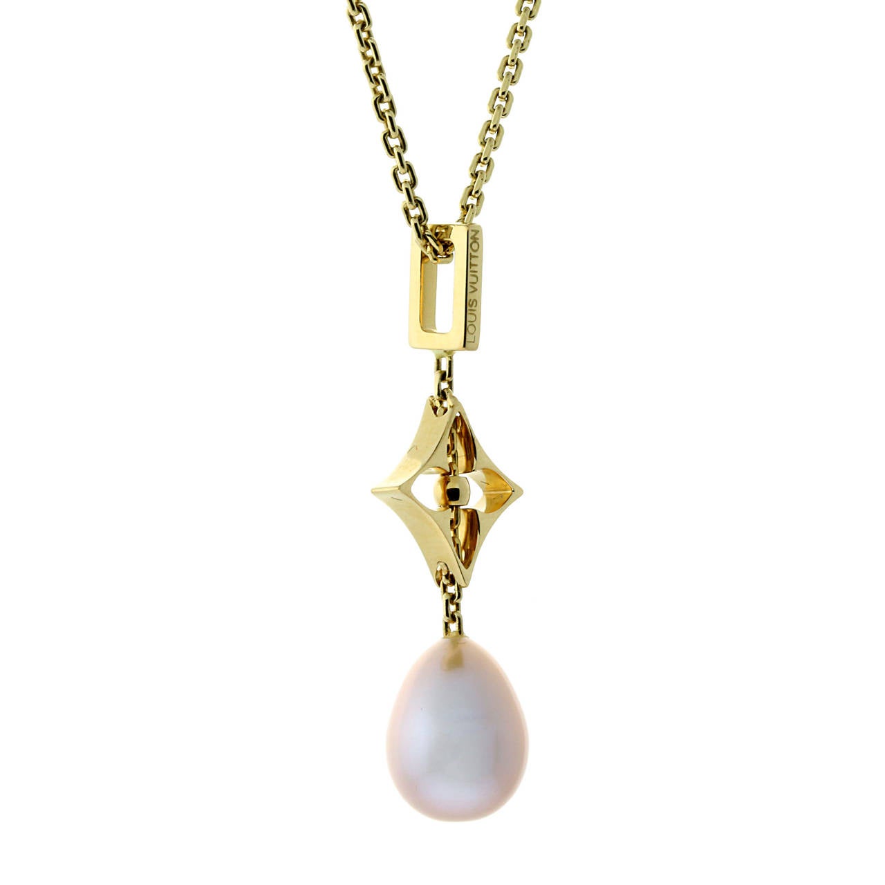 A meticulous authentic Louis Vuitton necklace featuring a pearl as the irresistible centerpiece in 18k yellow gold.

Necklace Length: 15″
Pendant Dimensions: .47″ Inches wide by 1.45″ Inches in length

Inventory ID: 0000190