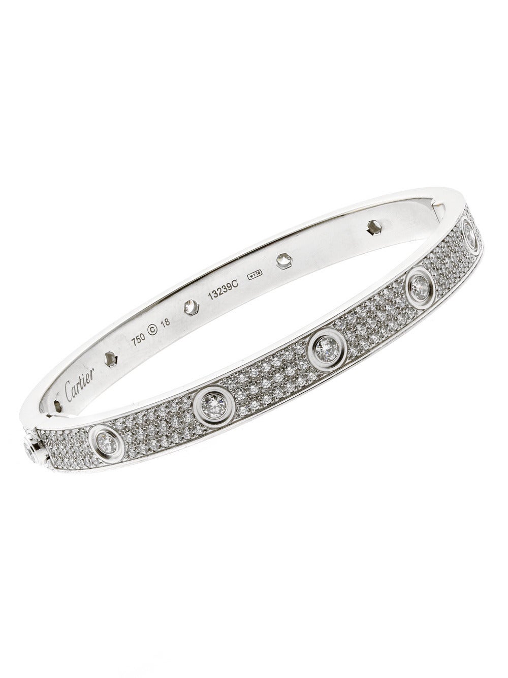 A spectacular Cartier Love Diamond Bangle bracelet crafted in 18k White Gold featuring 3.9cts Vvs1 E-F Color Round Brilliant Cut Diamonds. 

The bracelet measures 18cm and will fit a wrist up to (7.08