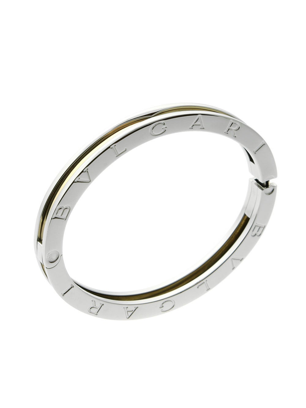 The chic bangle perfect for everyday wear by Bulgari from the legendary BZERO1 collection combines stainless steel and 18k yellow gold. The bangle measures 6.5MM Wide (.25″ Inches), and has a weight of 25 grams.
