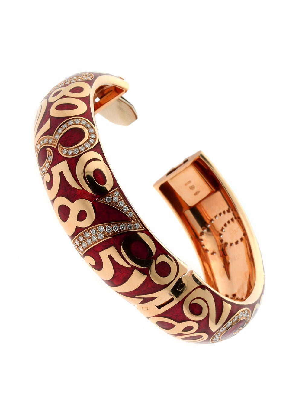 An incredible Franck Muller Crazy Hours bangle bracelet in 18k rose gold adorned by the finest Franck Muller round brilliant cut diamonds. The bracelet is laced with a beautiful red enamel to accentuate the rose gold.

Width: .70″ Inches