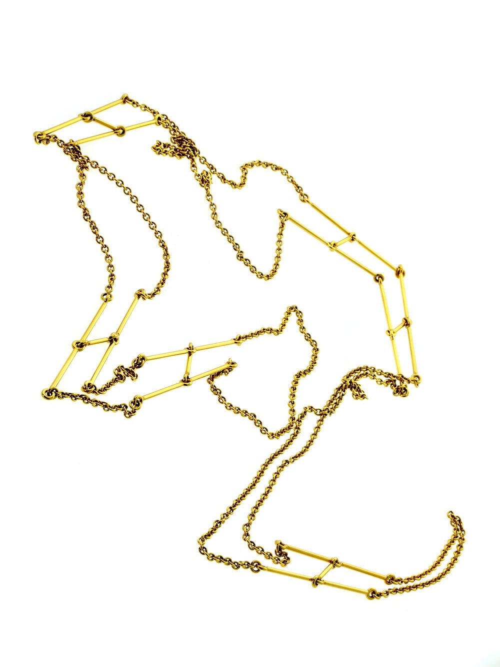 A rare find from Hermes this luxurious scarf necklace is crafted in 18k yellow gold, measuring 40