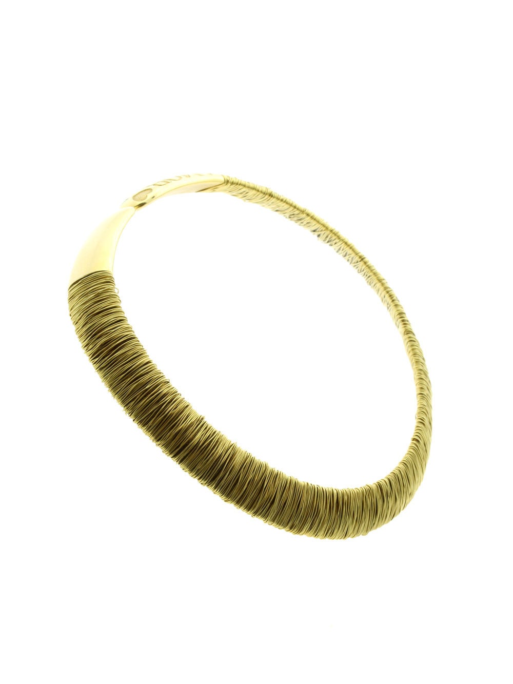 A magnificent Pasquale Bruni choker crafted in 18k yellow gold featuring a flawless marriage of classic design and modern elements.

Weight: 117.5 Grams
Measurements: The necklace measures .59″ inches wide
Necklace Length: 15.5″

Inventory ID: