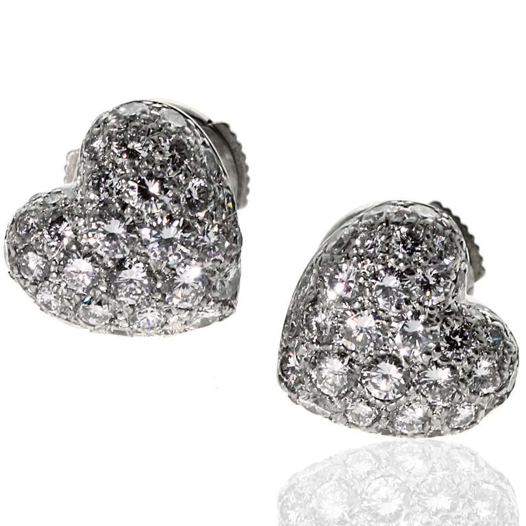 Stunning 18k White Gold Puffed Heart Diamond earrings by Cartier, adorned with 1.5ct appx Vvs1 E-F Color Round Brilliant Cut Diamonds. The earrings have a weight of 3.4 grams and a diameter of 10mm (.39″ inches).

Your Price: $8,999
Cartier