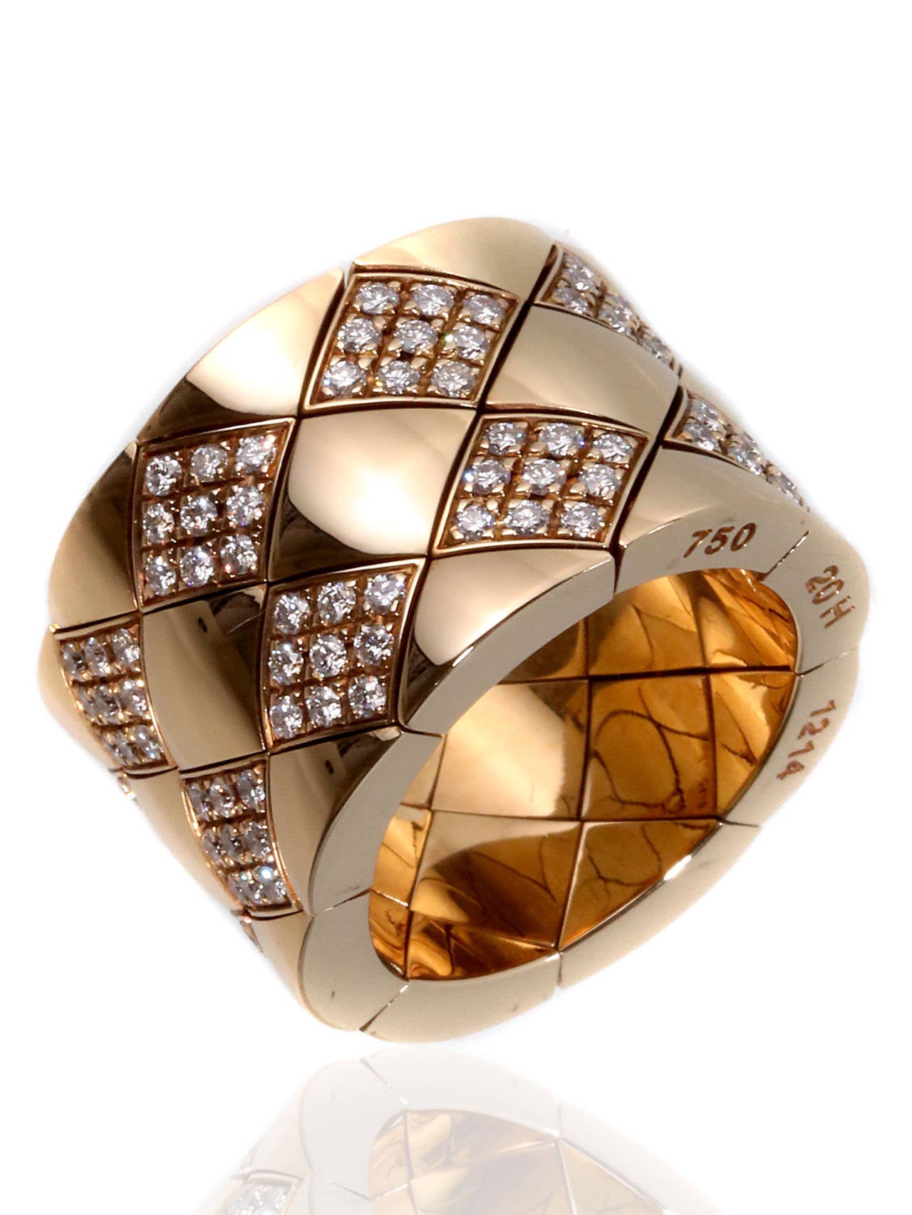 Fabulously studded with Vs round brilliant cut diamonds this chic Chanel Matelasse diamond ring is crafted in 18k yellow gold, measuring 13mm wide, and is sz 5 US.