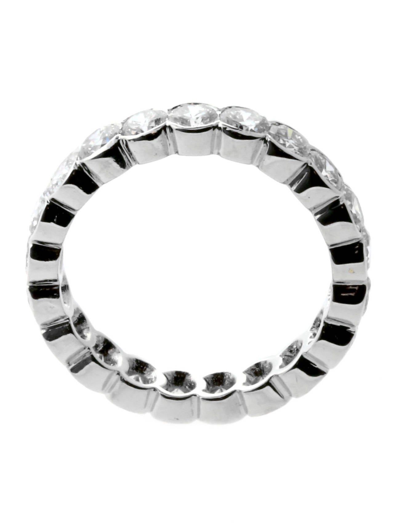 A fabulous Van Cleef & Arpels eternity band featuring 1.81ct of the finest Van Cleef & Arpels round brilliant cut diamonds immaculately set in 18k white gold

Size: US 4 1/2 / EU 48
Dimensions: .13