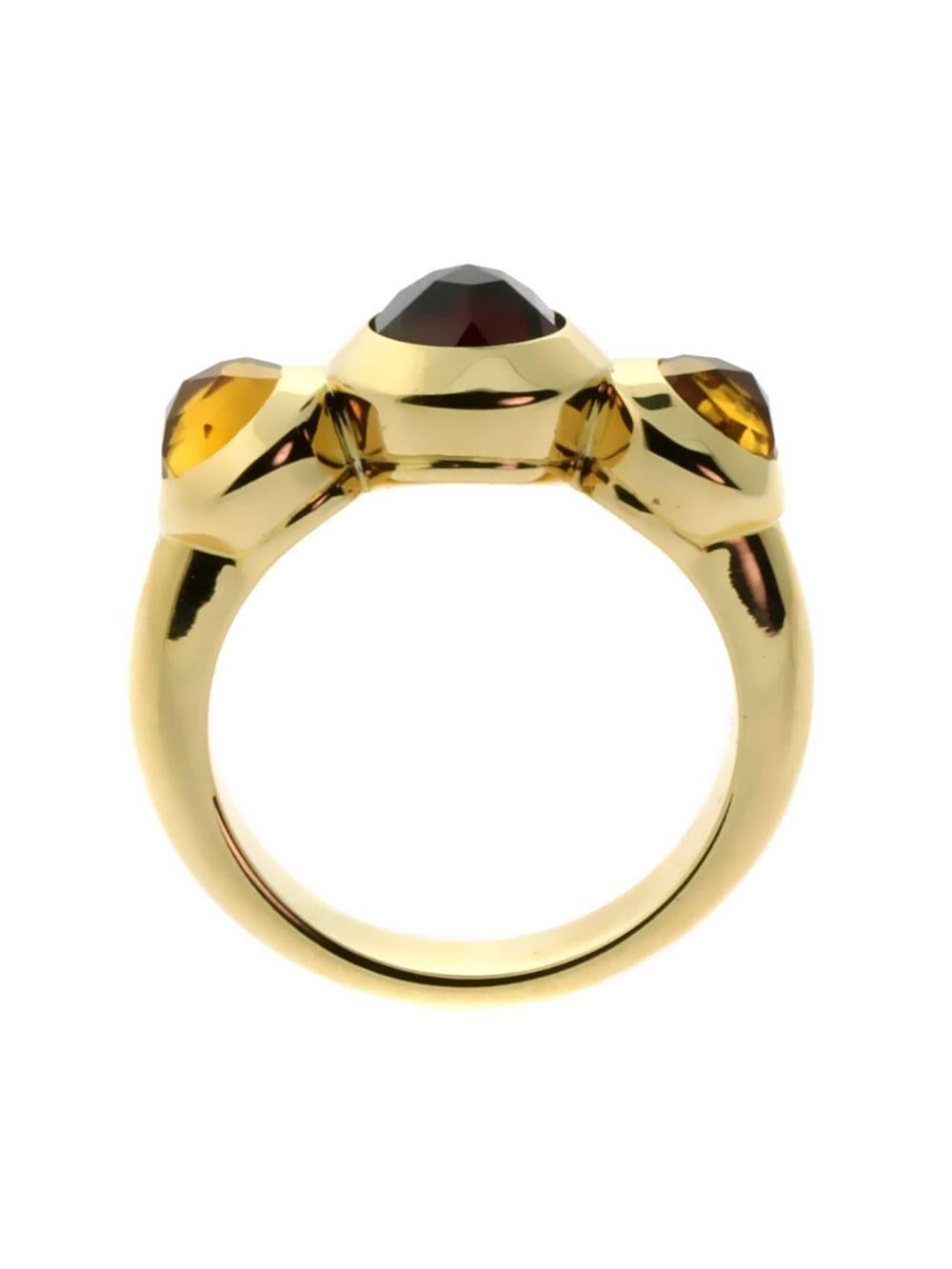 A chic authentic Tiffany & Co ring featuring Citrine and Garnet in radiant 18k yellow gold.

Size: US 5
Dimensions: 8.5mm Wide (.33″ Inches)

Inventory ID: 0000006