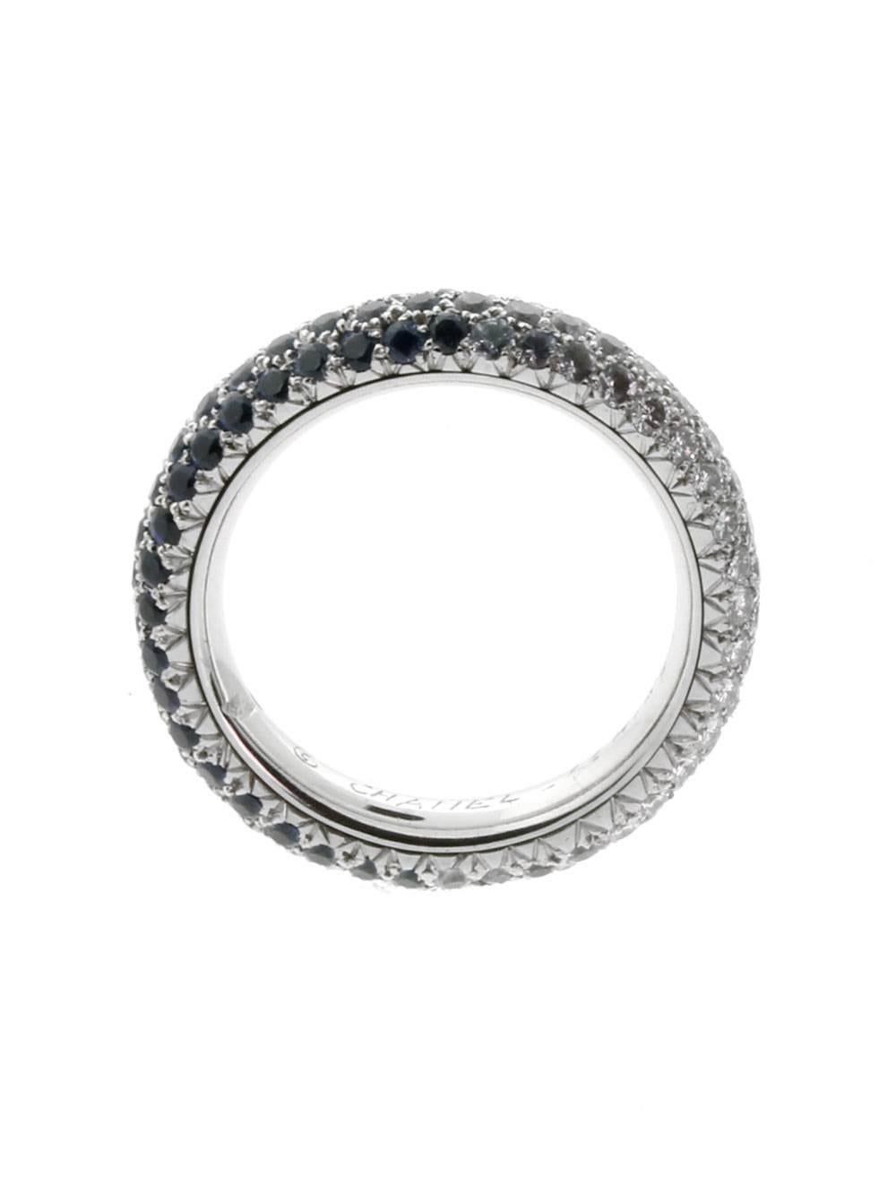 A magnificent authentic Chanel eternity ring set with the finest Chanel round brilliant cut diamonds, and sapphires in 18k white gold.

Size: EU 55 / US 6
Dimensions: 4mm Wide (.15″ Inches)

Inventory ID: 0000038