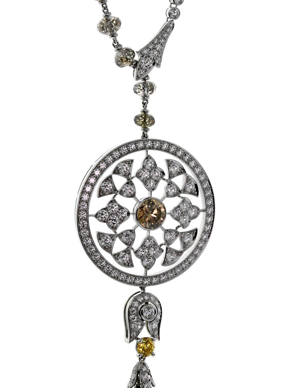 A magnificent Cartier Surya necklace lavishly set with 328 of the finest Cartier diamonds (57.98cts) in platinum. 

1 Fancy Brown Diamond Weighing 1.01ct
10 Diamond Pearl Beads 7.61ct
64 Brown Diamond Briolettes 40.9ct
1 Fancy Yellow Round