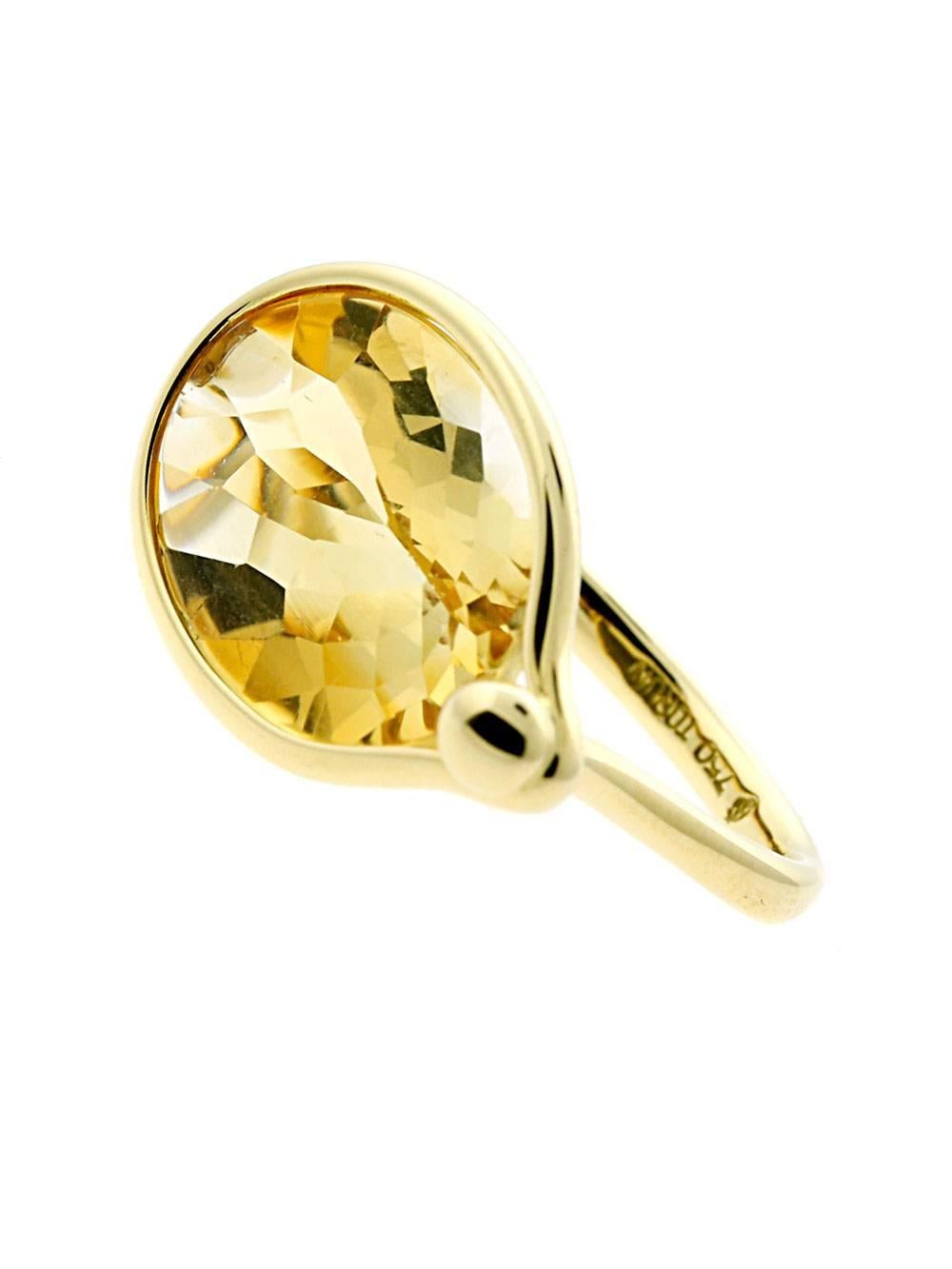 An authentic Georg Jensen ring featuring a gold hued citrine set in 18k yellow gold.

Size: US 5
Dimensions: 15mm wide (.59″ wide)

Inventory ID: 0000302