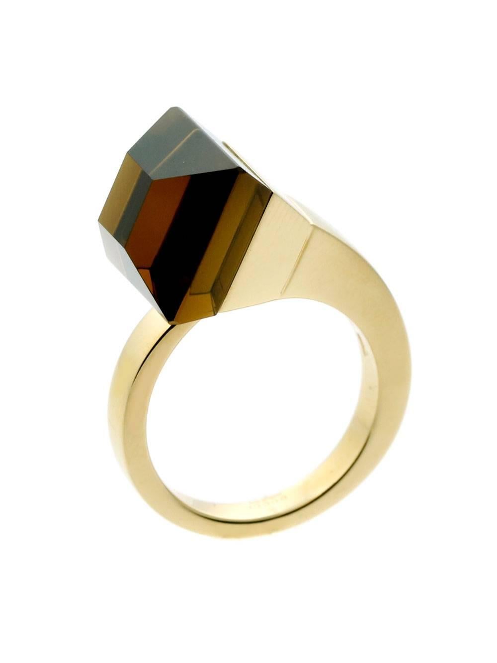 A fabulous Gucci gold ring set with a beautiful Smokey Quartz in 18k yellow gold. 

Size: US 7
Dimensions: 12mm wide (.47″ wide)

Inventory ID: 0000286