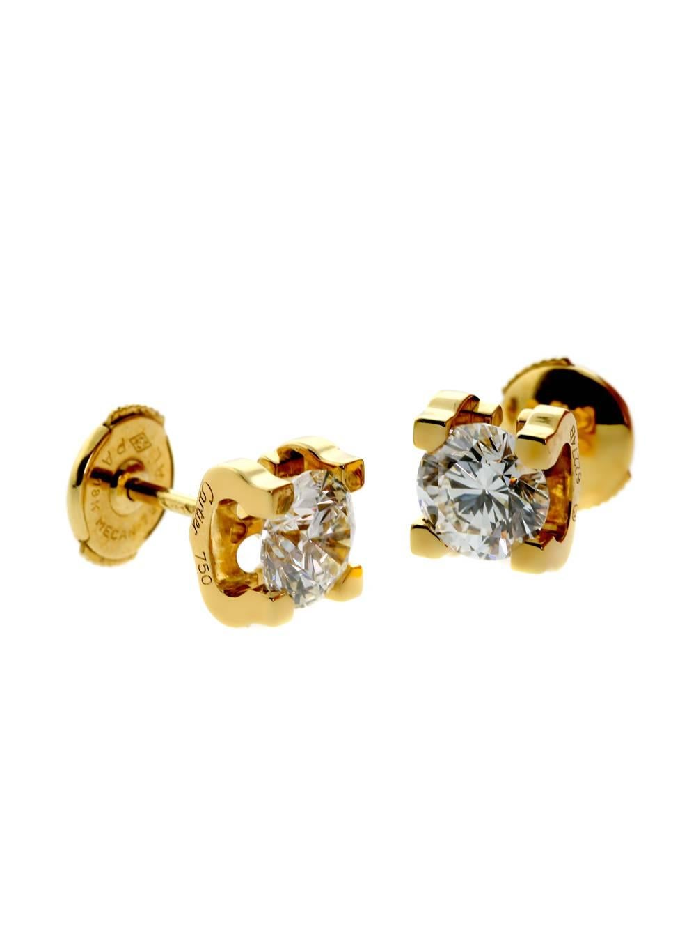 These diamond stud earrings exemplify tradition as they feature a yellow gold setting that clasps a round white diamond. Since each gem’s weight comes to slightly more than 1 carat, the earrings will glisten and twinkle with the slightest
