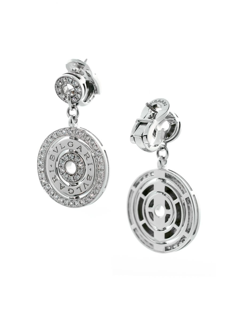 Simplicity and elegance unite to form these magnificent Bulgari 18k white gold earrings. The round pendant style design are adorned with the finest round brilliant cut diamonds.

Dimensions: 1.37 Inches in lenth

Inventory ID: 0000158
