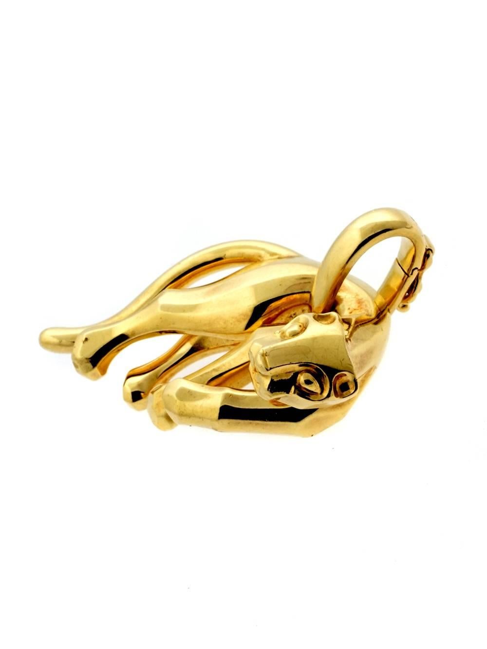 A magnificent Cartier 18k yellow gold Panthere pendant precisely molded gently swooping tail and lithe design.

Weight: 20.5 Grams
Dimensions: 1.14″ Inches wide by 1.18″ Inches in length

Inventory ID: 0000098