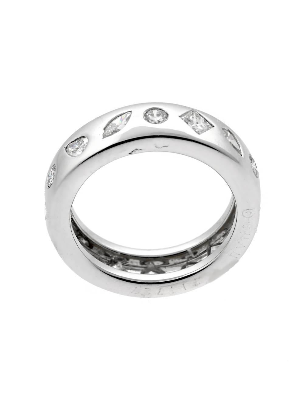 Old and new come together in this 18-karat white gold band. To give the ring its traditional style, artisans formed the setting from classic white gold. For the contemporary elements, they added diamonds featuring various cuts such as marquise,