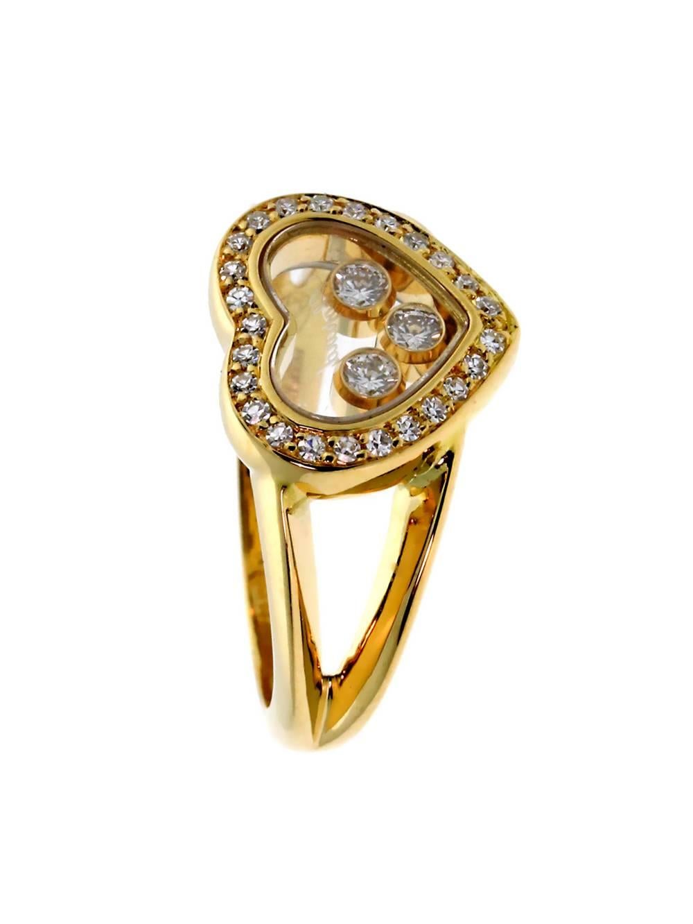 A stunning authentic Chopard happy diamond ring crafted in 18k yellow gold adorned with 28 Round Brilliant Cut VS1 Clarity F-G Color .27Ct.

The ring measures (.43″ Inches) and is a size 4 1/2 (Resizeable)

Inventory ID: 0000257