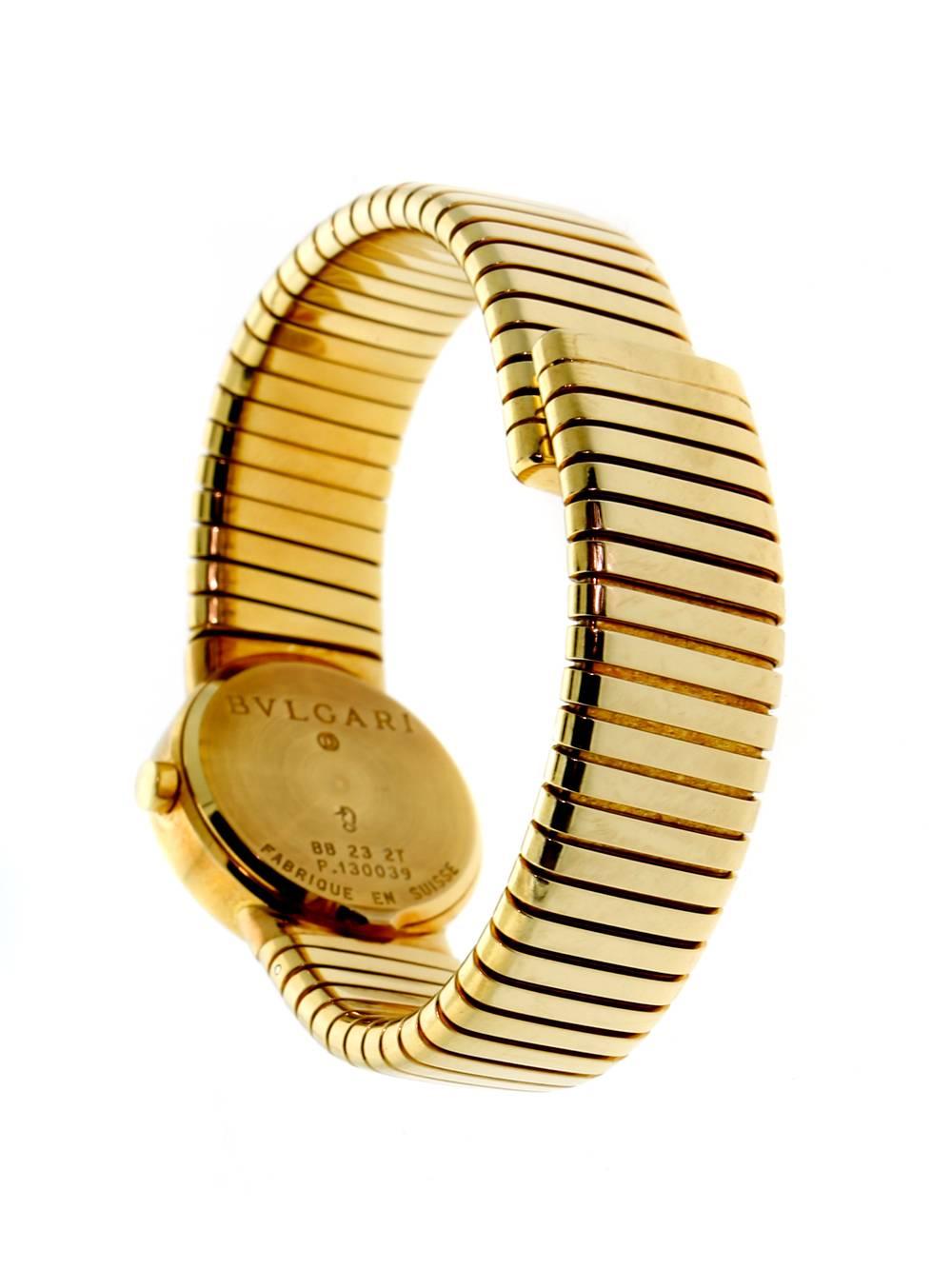 This Bvlgari Tubogas model is finely crafted from solid 18k yellow gold. The black dial features gold stick hands and hour markers with Arabic numerals at twelve and six o’clock, the watch has not been polished and is showing lovely patina!

The