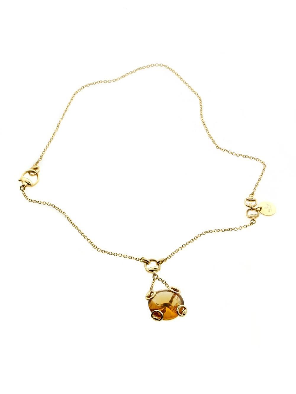 This stunning necklace by Gucci features a large faceted Citrine engulfed in a timeless 18-karat yellow gold Horsebit Motif

Length: 17″ followed by a drop of 1.75″
Citrine: 18mm in diameter

Inventory ID: 0000282