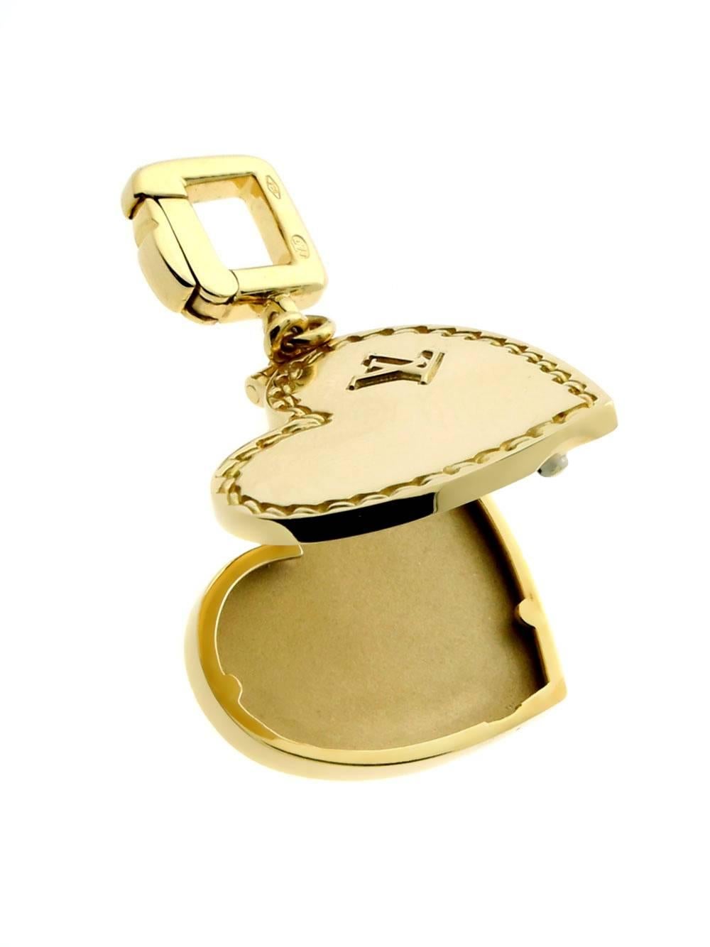 Louis Vuitton heart locket charm pendant in 18k yellow gold with an iconic 