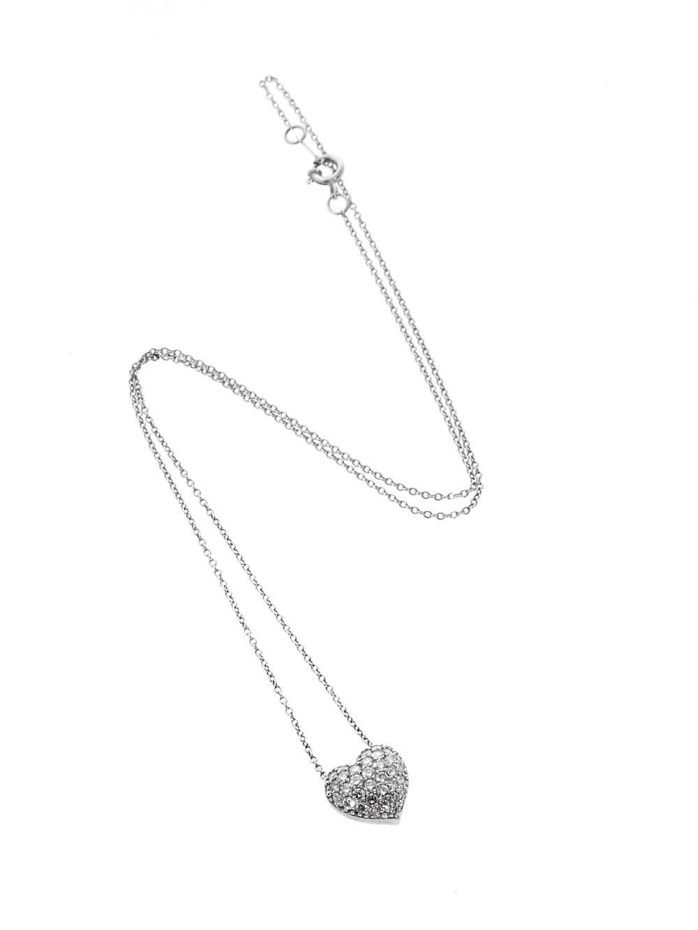 A magnificent Cartier diamond heart draped with magnificent round brilliant cut diamonds set in platinum. The necklace measures 16″ in length,

Dimensions: The pendant has a diameter of 11mm (.43″ Inches)

Inventory ID: 0000102