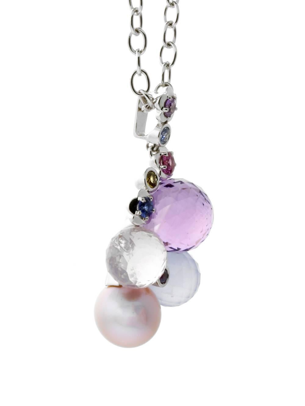 With a mixed eclectic blend of feminine baubles, this versatile Chanel necklace contains various gemstone accents and is ideal for the woman who loves to wear shades of pink and violet. 

Dimensions: .74″ wide by 1.49
