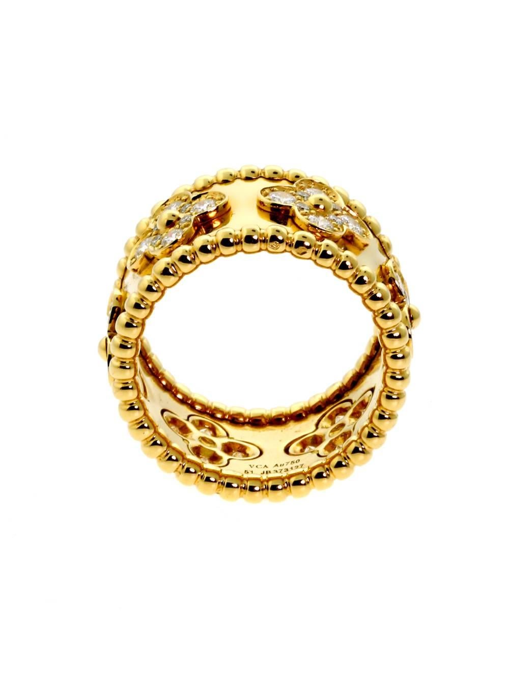 Stately and sophisticated, this yellow gold ring features meticulous craftsmanship. Gold beading encircles the adornment, and its smooth base establishes a solid foundation. The ring’s blend of white diamonds and intricate design elements come