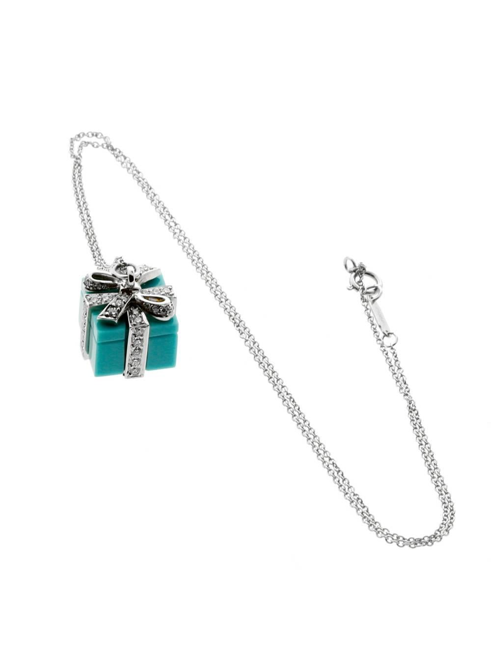 A stunning example of an icon in the jewelry world, this fantastic necklace is made of turquoise, platinum, and adorned with magnificent round brilliant cut diamonds. The pendant is suspended by a Tiffany and Co platinum necklace measuring 16