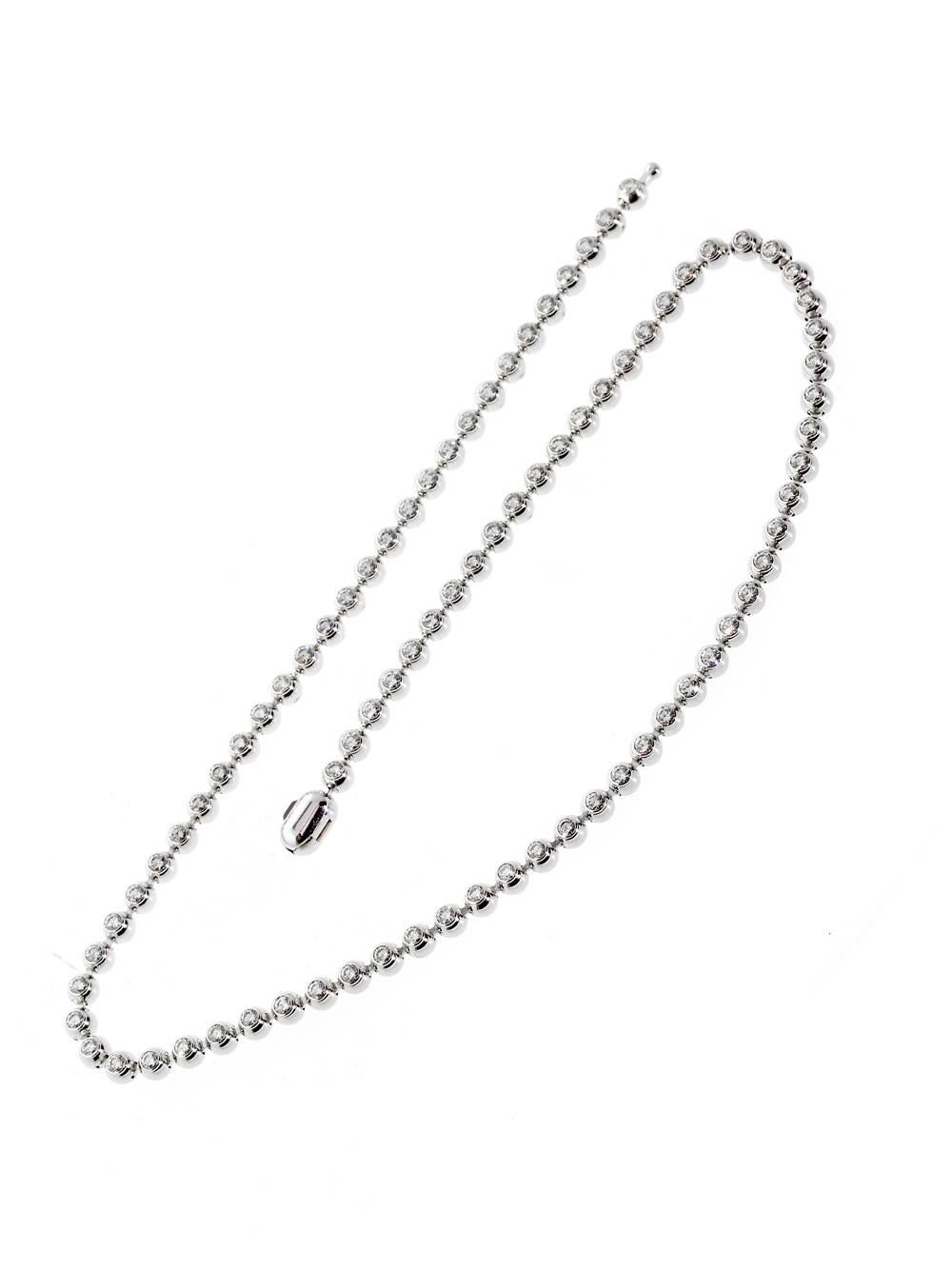 A chic Cartier beaded design tennis necklace in 18k white gold featuring 4.62cts of the finest Vs quality round brilliant cut diamonds. 

Necklace Length: 15″

Inventory ID: 0000086