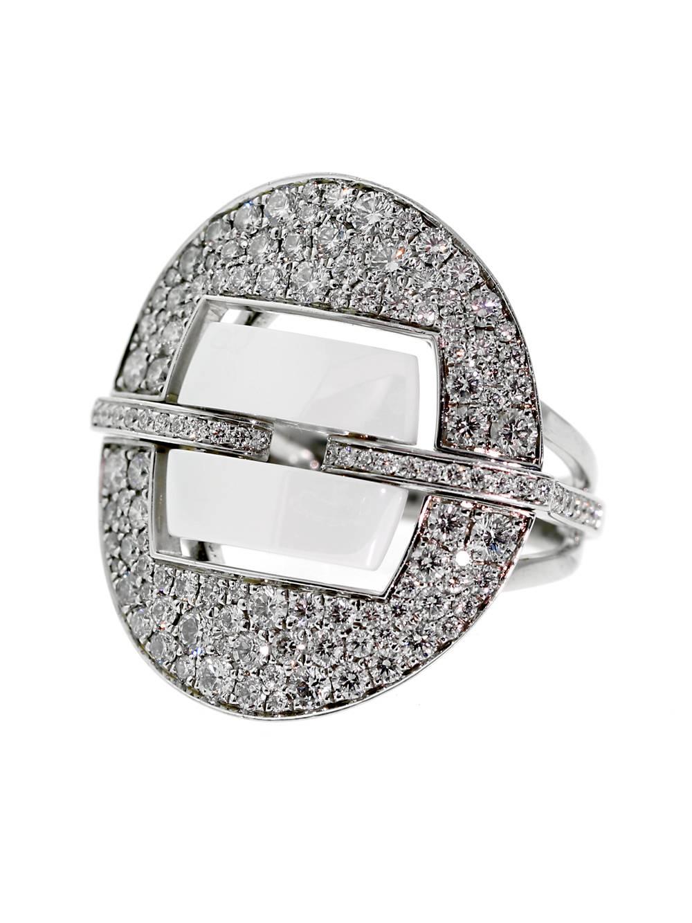 Ultra modern Chanel diamond ring showcasing a shield design adorned with round brilliant cut diamonds showcasing the high tech white ceramic center.

Chanel Retail Price: $13,500 + Tax

Size 5 1/2 ( Resizeable)
