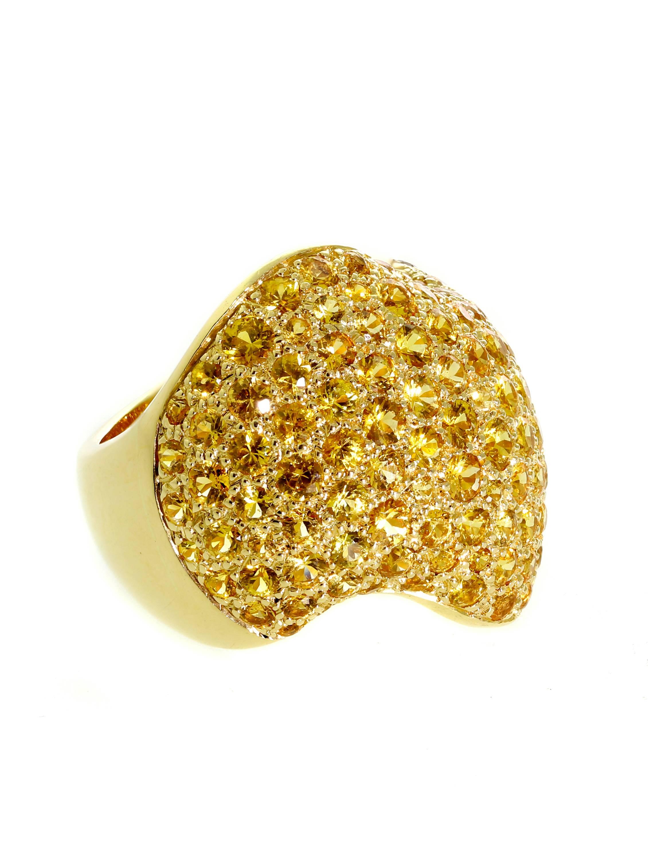 Van Cleef & Arpels Pave ring in 18k yellow gold set with beautiful golden yellow sapphires in an intricate swirling design 1" in width.

Size: US 5 1/4 / EU 50 (Resizeable)

Inventory ID: 0000226