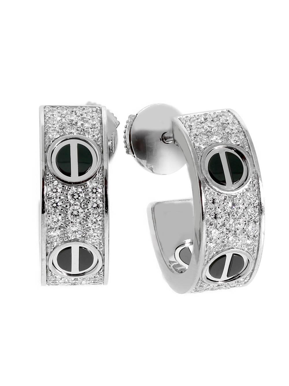 A fabulous pair of Cartier “Love” diamond earrings featuring ceramic screw motifs adorned with 88 of the finest round brilliant cut diamonds in 18k white gold.

Cartier Retail: 16,500 + Tax

Dimension: .62″ in diameter
Width: .25″

Inventory