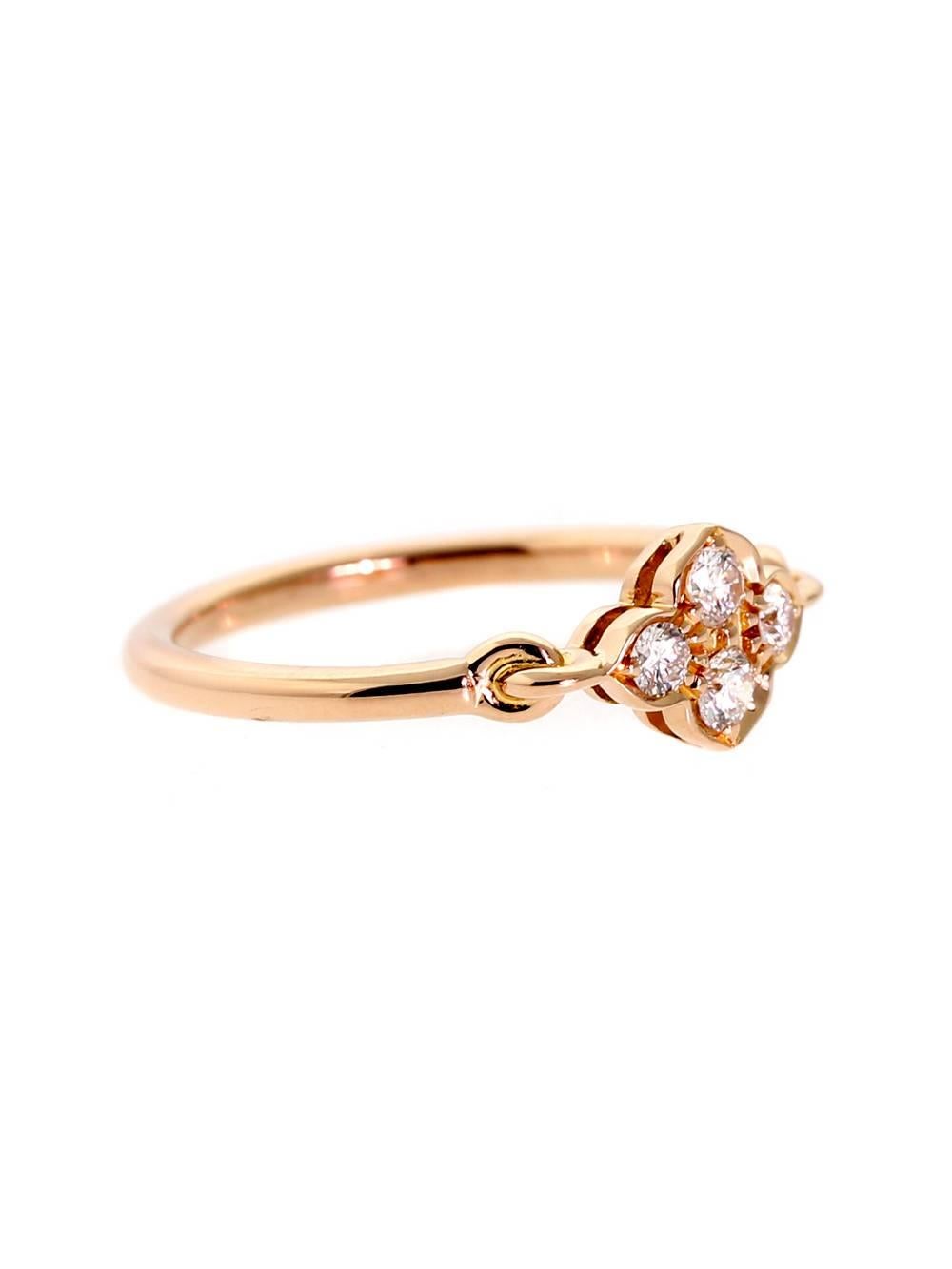 A classic Cartier flower diamond ring adorned with 4 round brilliant cut diamonds set in 18k rose gold. The ring is a size 3.75 and is resizeable.

Inventory ID: 0000329