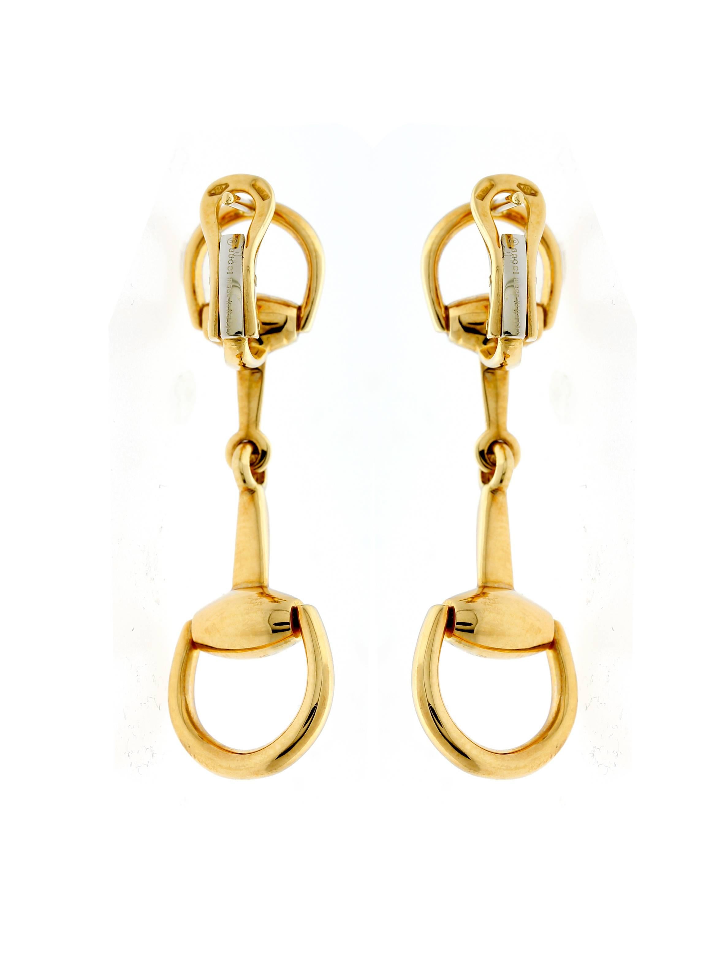 A stunning pair of warm Gucci 18k yellow gold 