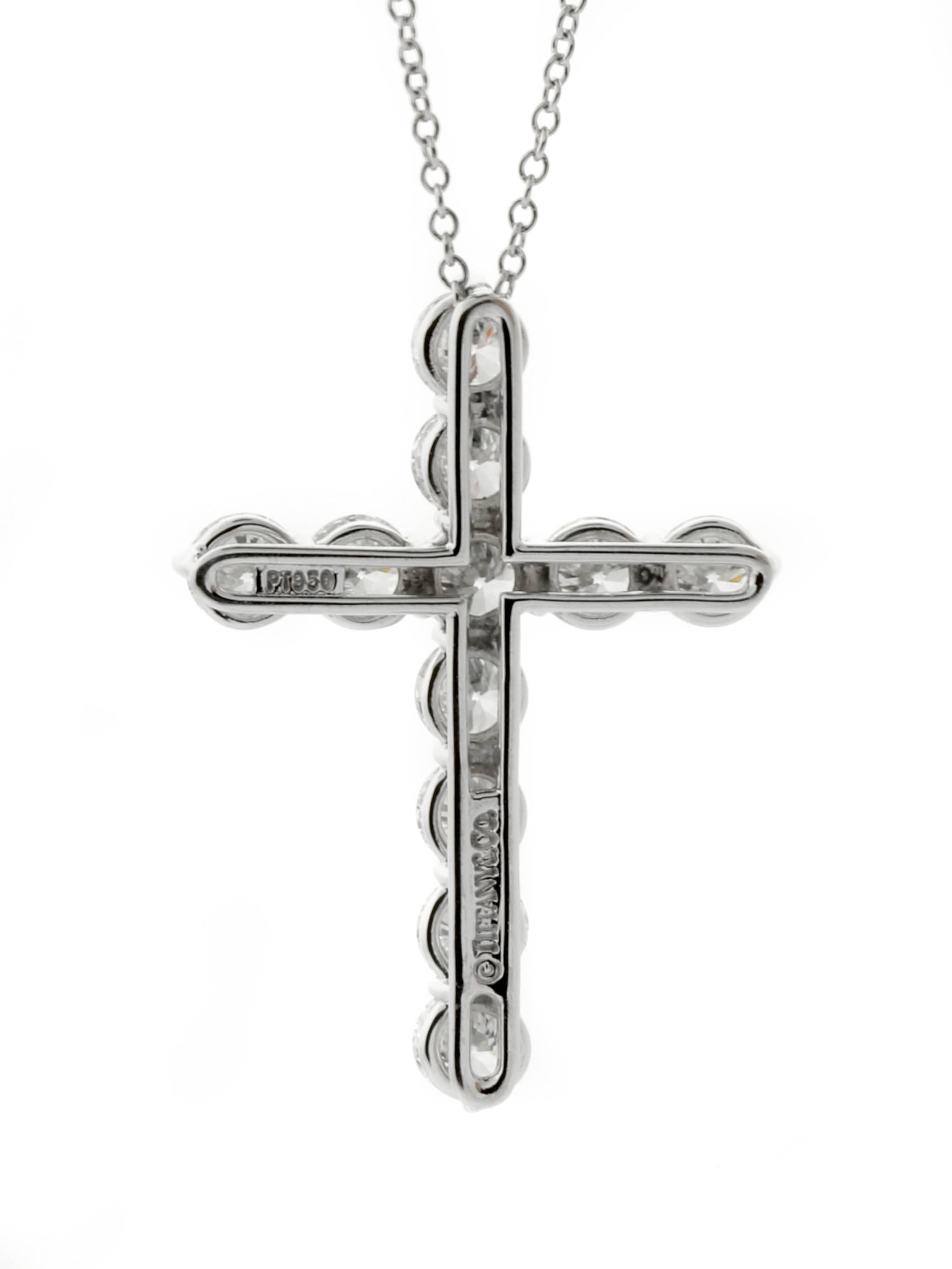 A timeless platinum diamond cross necklace by Tiffany & Co featuring 2.53ct of Vs round brilliant cut diamonds. 

The pendant measures .84
