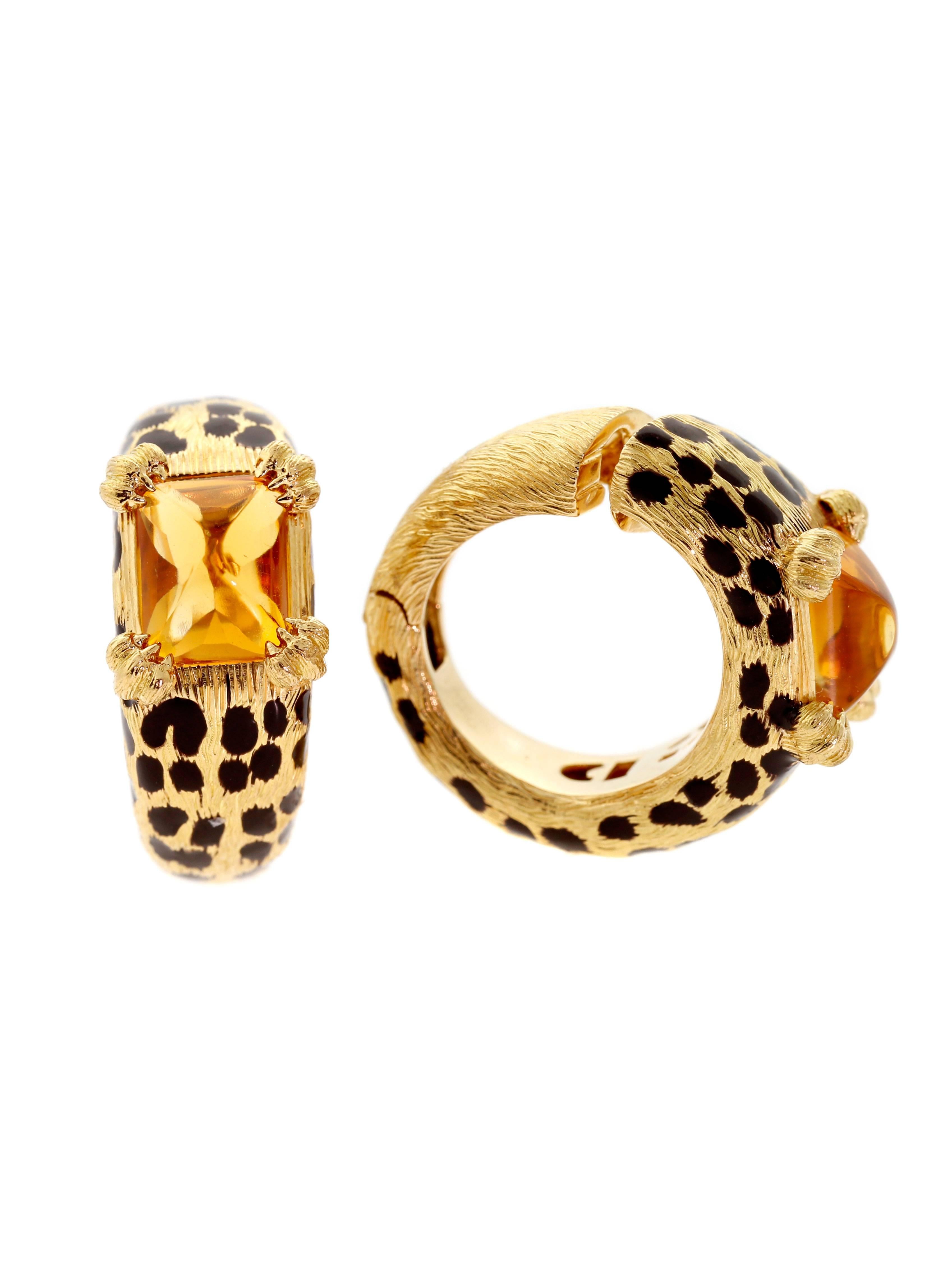 A stunning pair of Dior earrings featuring Citrine, and enamel spots to represent a leopard. Crafted in 18k Yellow Gold weighing 28.4 grams.

Earring Width: .43