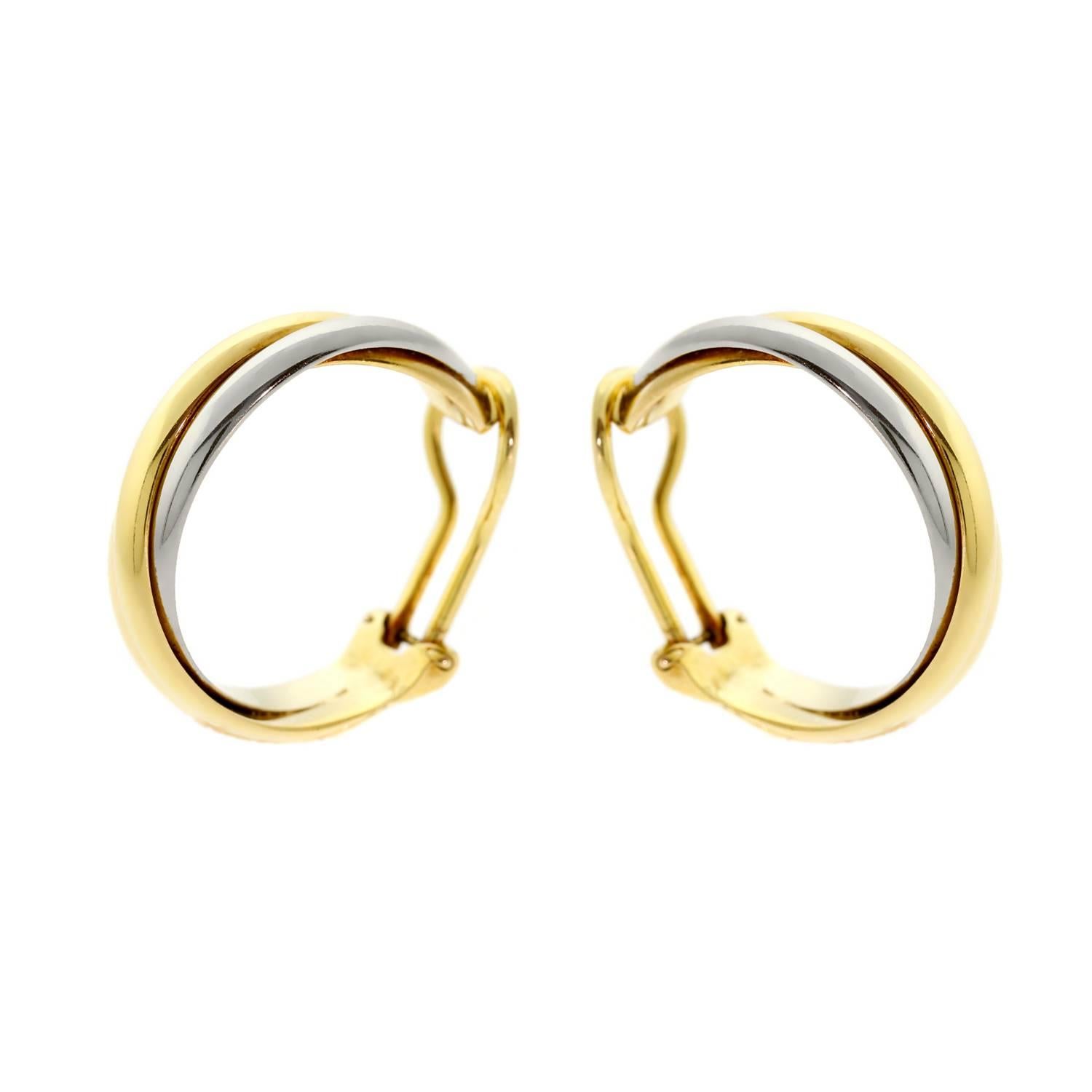 A timeless pair of authentic Cartier Trinity earrings featuring 18k white, yellow, and rose gold. The earrings measure .90" in diameter

Inventory ID: 0000519