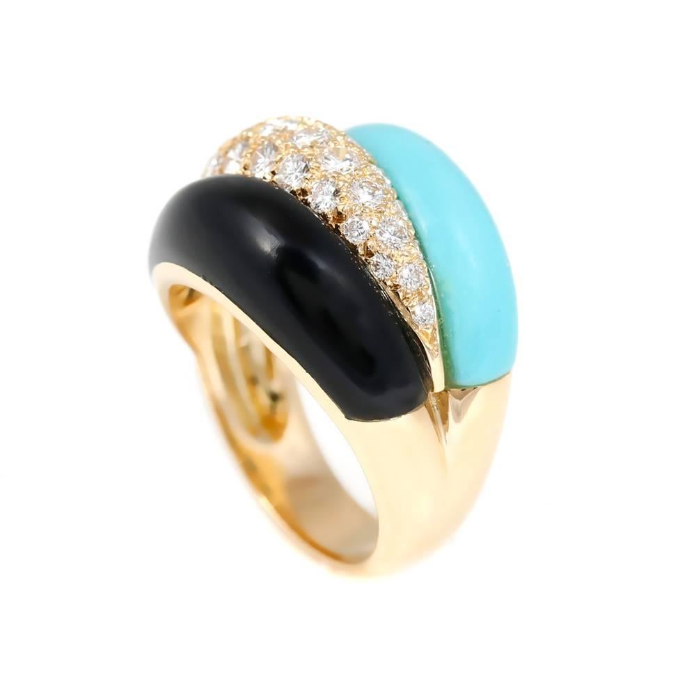 A fabulous Van Cleef & Arpels Bombe style cocktail ring set with the finest Van Cleef & Arpels round brilliant cut diamonds, onyx, and turquoise in 18k yellow gold.

Size 6 1/2

Inventory ID: 0000525