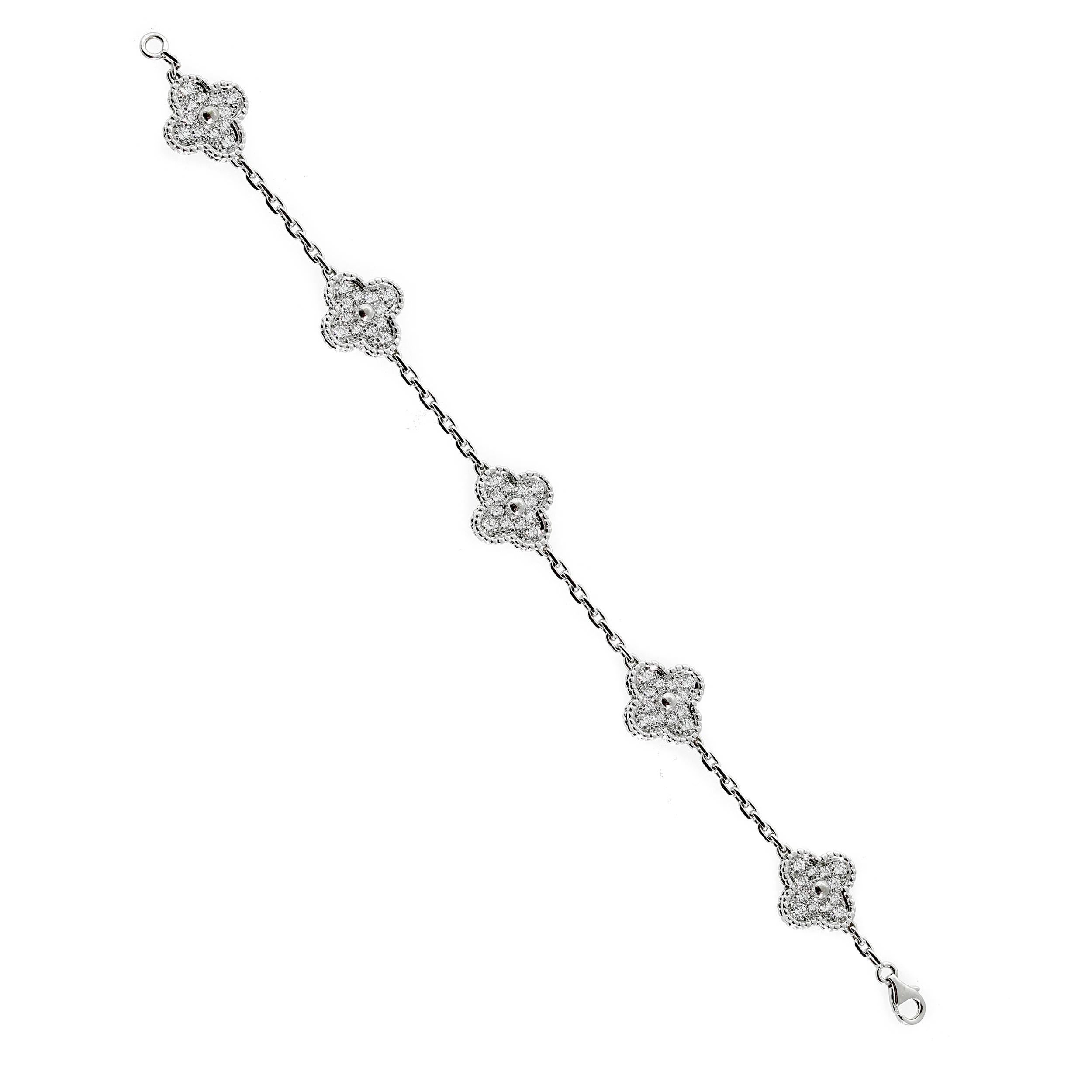 A classic Van Cleef & Arpels Vintage Alhambra bracelet featuring 5 iconic stations adorned with the finest Van Cleef & Arpels round brilliant cut diamonds in 18k white gold.

Retail: 25,800+ Tax

Inventory ID: 0000542