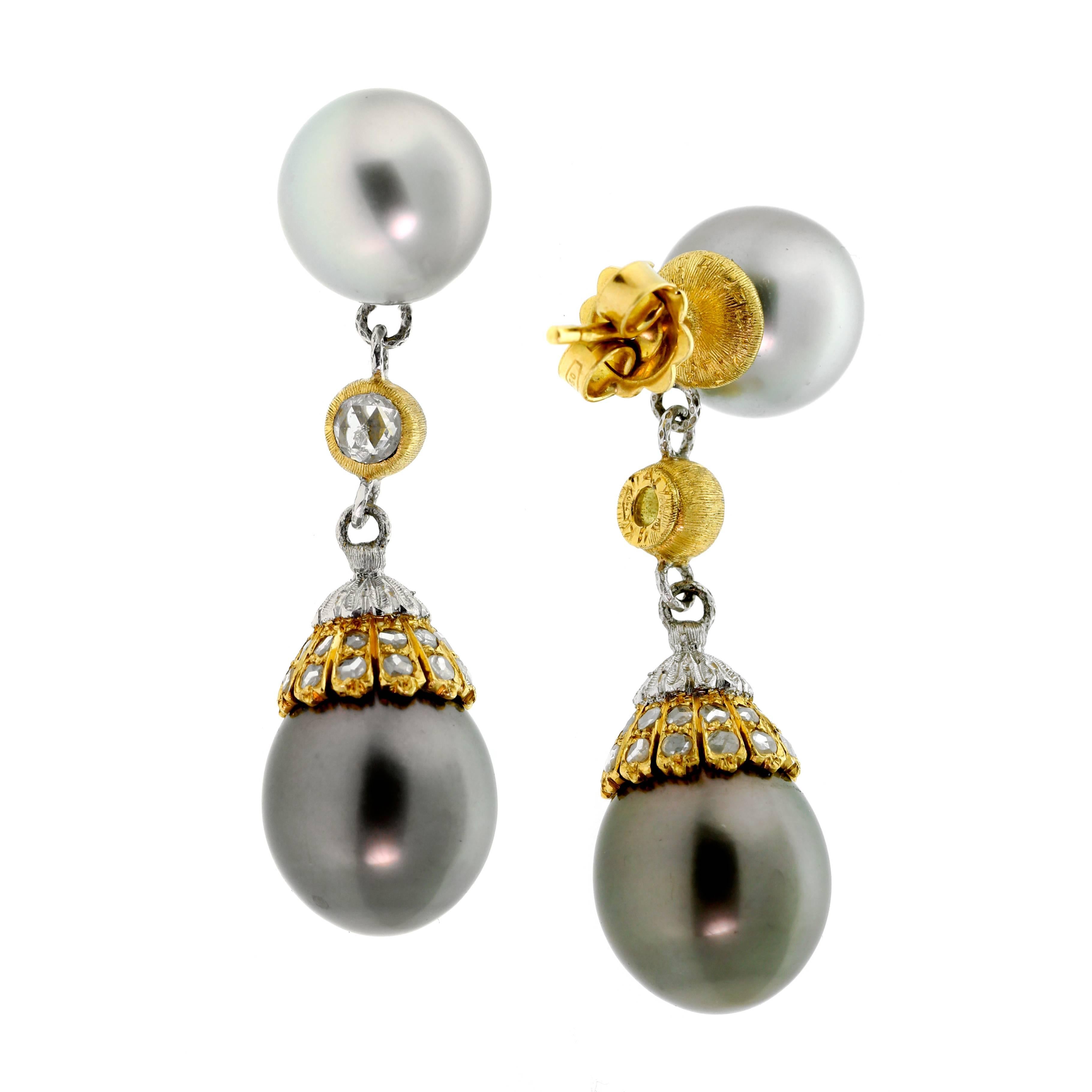 A fabulous pair of Buccellati earrings featuring round diamonds set in 18k white and yellow gold adorned with pearls.

Inventory ID: 0000577